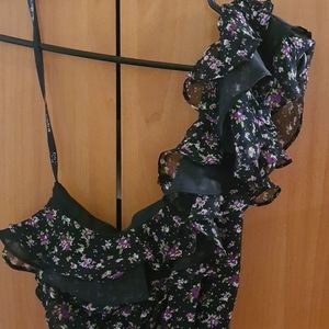 Bebe one shoulder floral black top (size XXS)